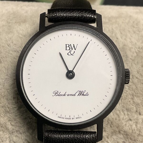 Butler and Wilson Briel Quartz wristwatch with black strap.