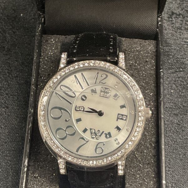 B&W Butler and Wilson watch with spinning dial and crystal details.