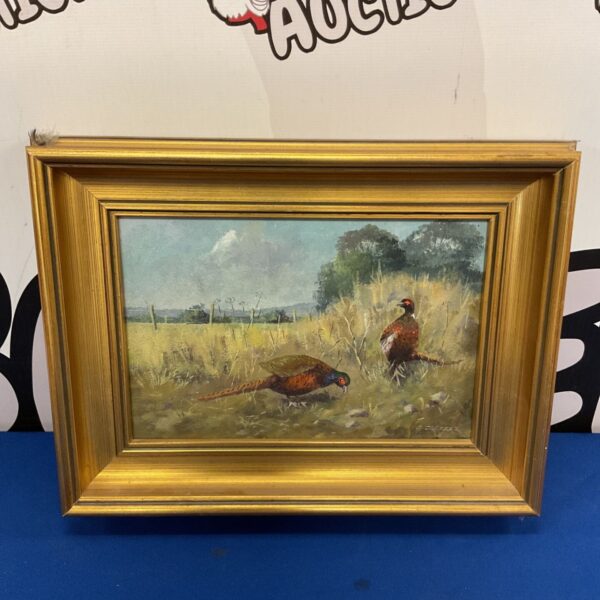 Vintage oil painting of pheasants signed C Crocker in a field setting.