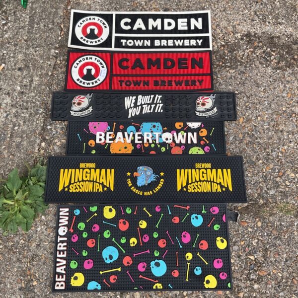 Job lot of Camden, Beavertown and Wingman branded rubber bar mats.