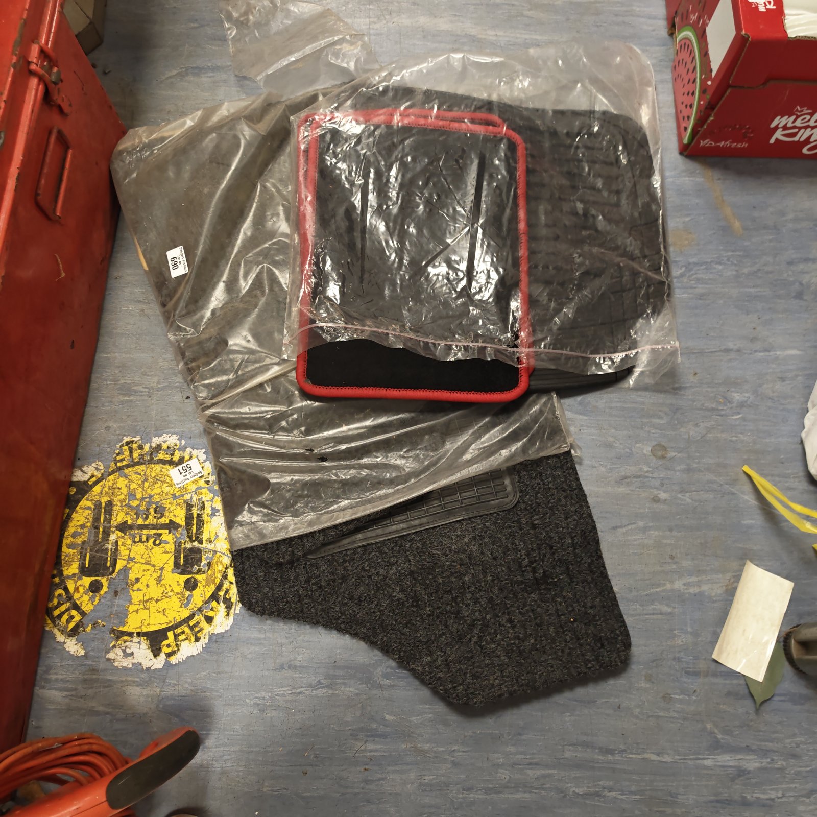 Grey car mats set for vehicle floor protection.
