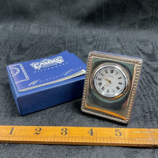 Carrs of Sheffield silver plated desk clock with Roman numeral dial.