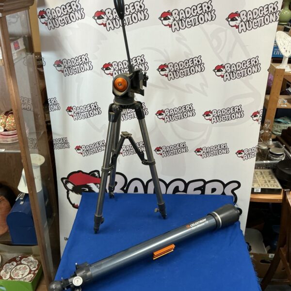Celestron AstroMaster 70 AZ telescope with tripod for astronomy.