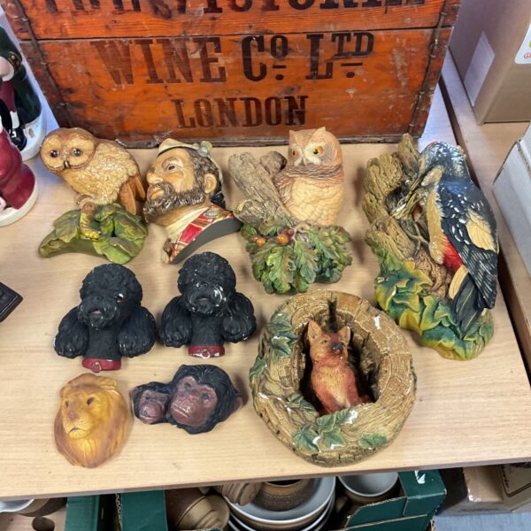 Vintage chalkware wall plaques, including Bossons style head studies.