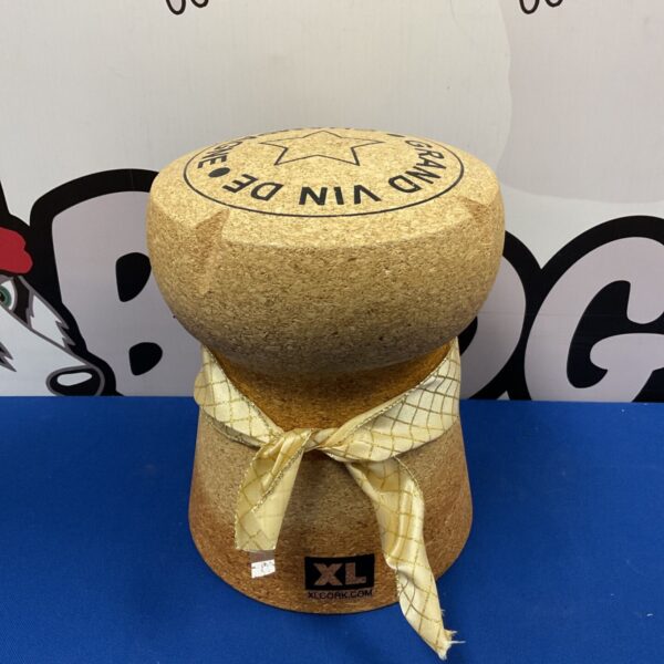 Large champagne cork display from xlcork.com, a unique collectible.