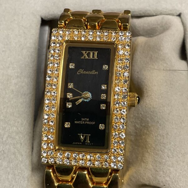 Gold and rhinestone Chancellor ladies wristwatch close-up.