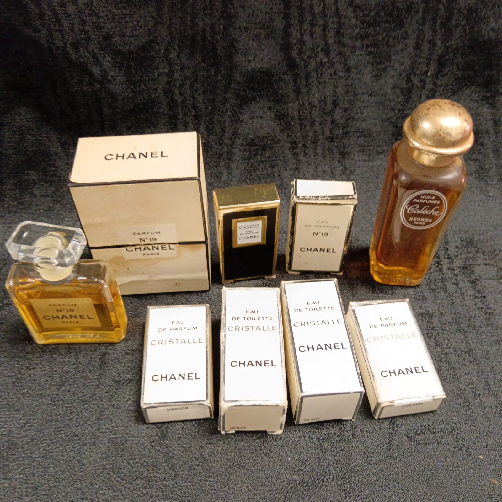 Vintage Chanel and Hermes miniature perfume bottles collection.
