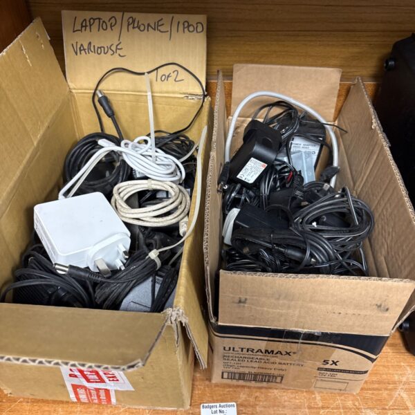 Assorted charger cables in two boxes, a mixed lot of power cords.