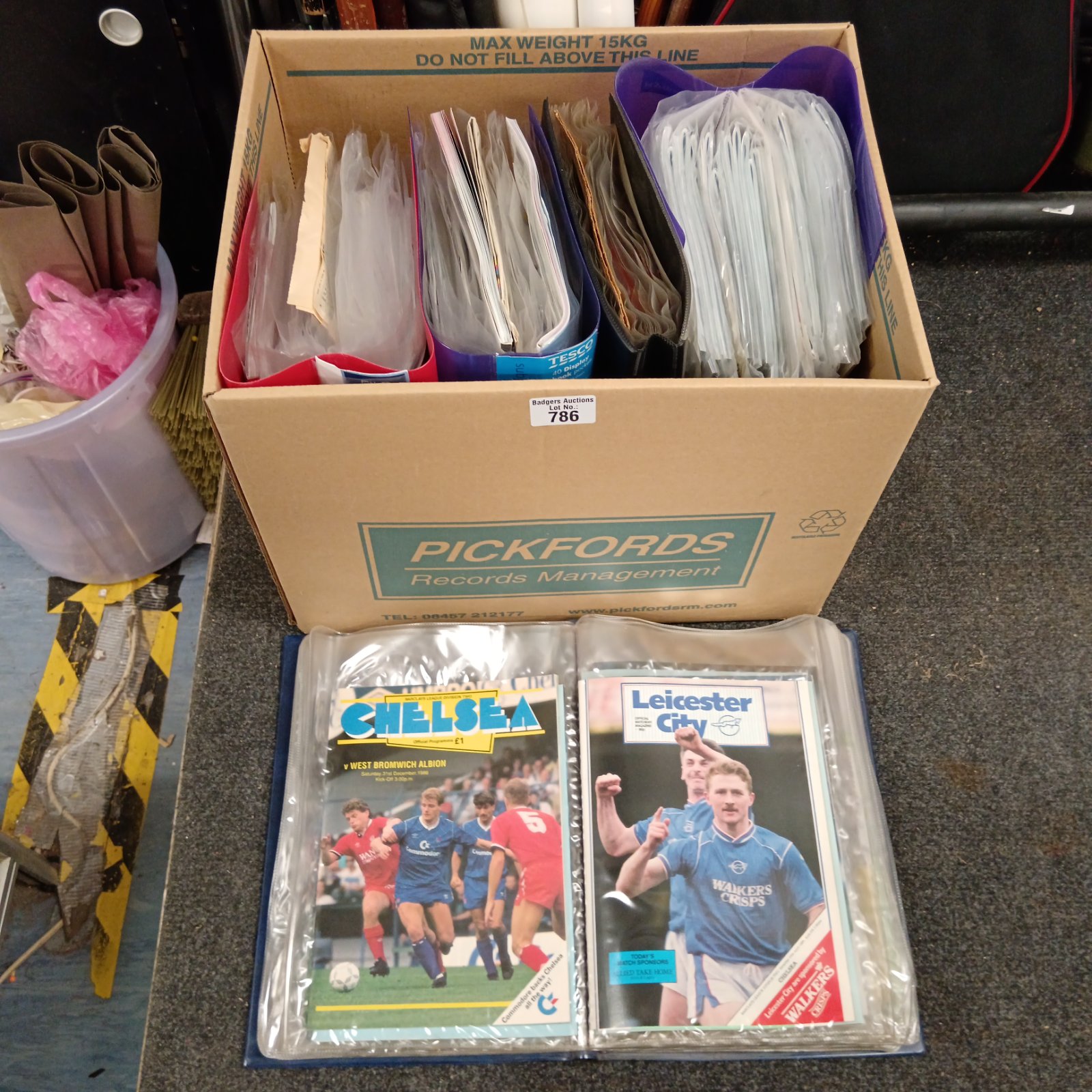 Chelsea football programmes collection in folders, vintage football memorabilia.