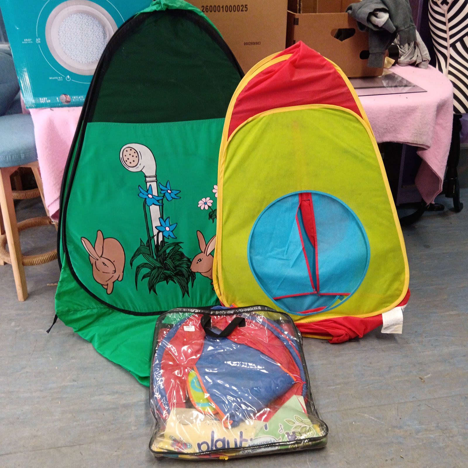 Colourful childrens pop up tent with cartoon animal design.