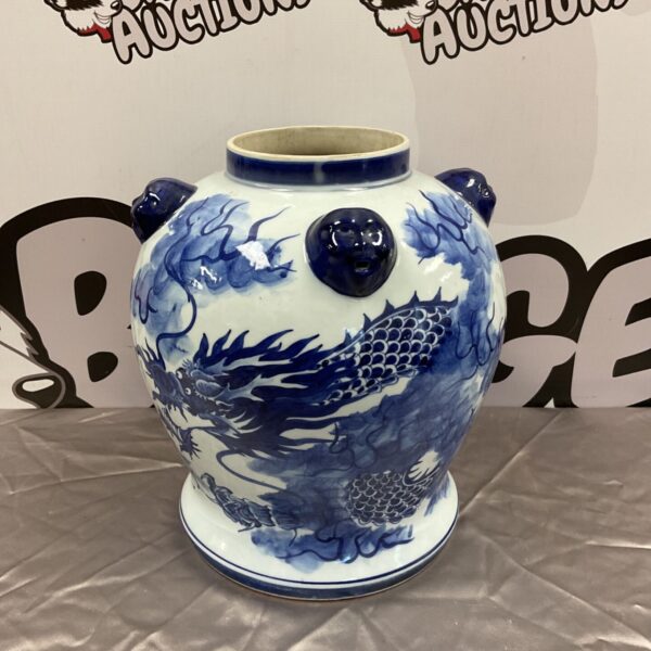 Detailed 20th century Chinese blue and white dragon ceramic jar.