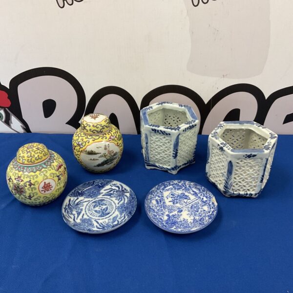 Antique Chinese incense burner set with blue and white porcelain design.