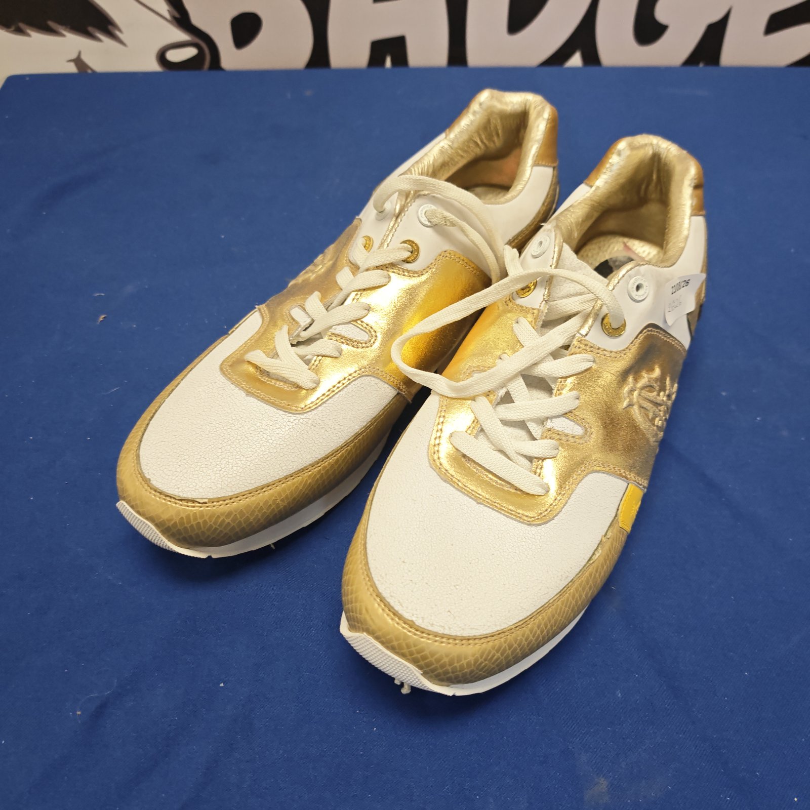 Gold and white Christian Audigier trainers, size 12, designer footwear.