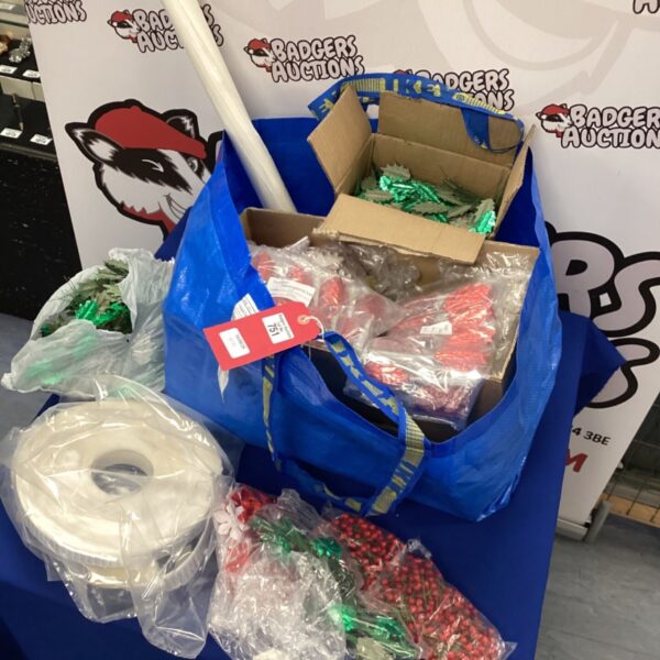 Lot of Christmas decoration kits with craft supplies.