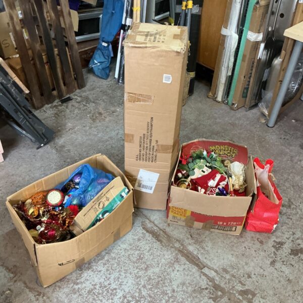 Christmas decorations bundle with tree and boxes of ornaments.
