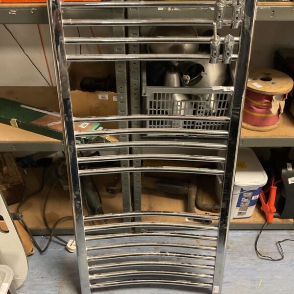 Chrome ladder heated towel rail for bathroom use.