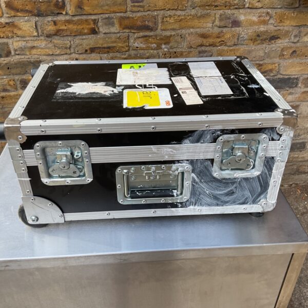 Black Citronic flight case with metal corners and castors.