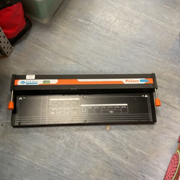 Colibri e-DaVinci book covering machine in used condition.