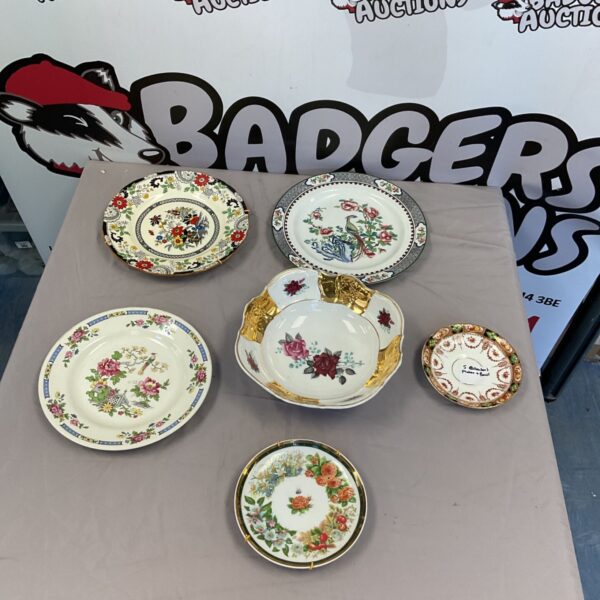 Vintage collectors plates including Coalport with floral designs.