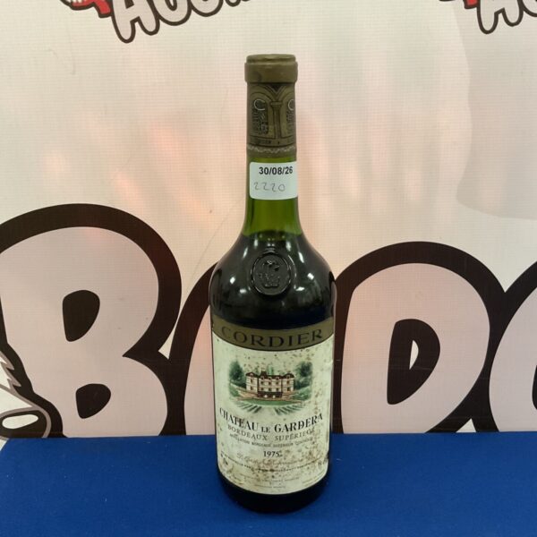 Sealed 1975 Cordier Chateau Le Gardera Bordeaux wine bottle.