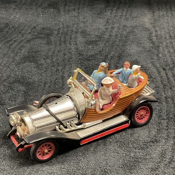 Vintage Corgi Chitty Chitty Bang Bang diecast car with figures.