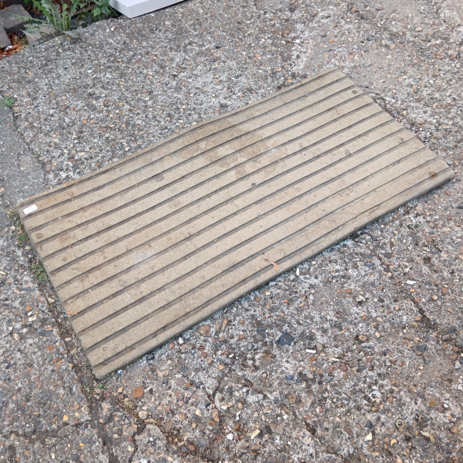 Vintage cork mechanics work mat with ribbed surface.