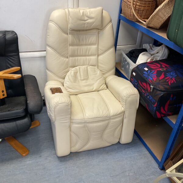 Cream leather massage recliner armchair for ultimate relaxation.