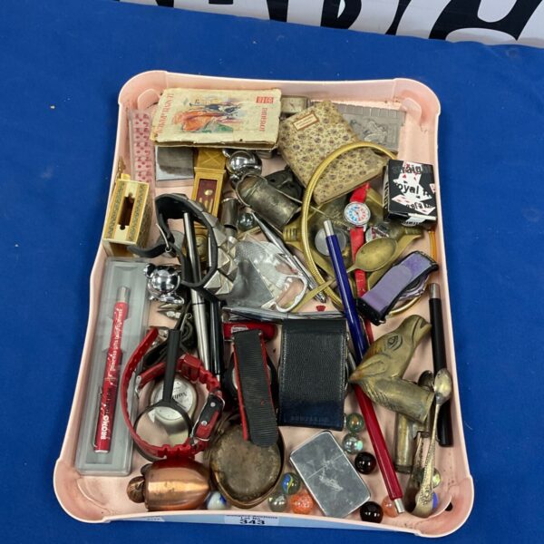 Tray of vintage pens, lighters and curious collectables.