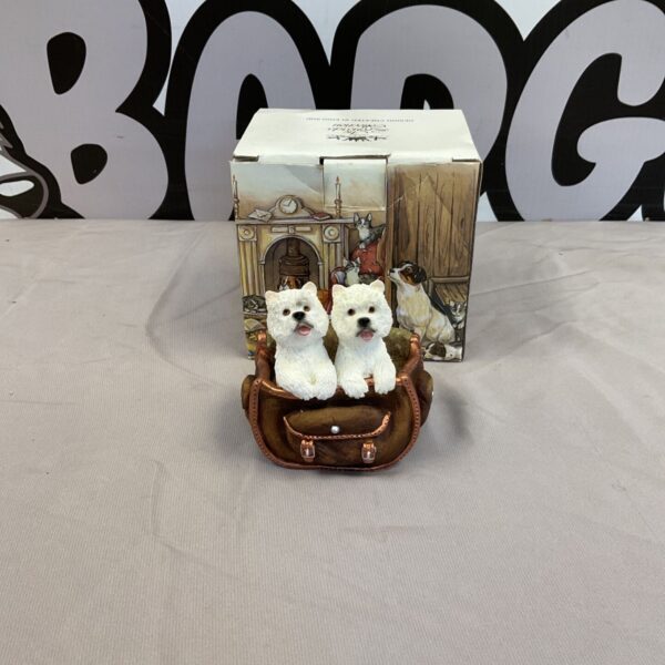 Leonardo Collection dachshund dog figures in a suitcase ornament.