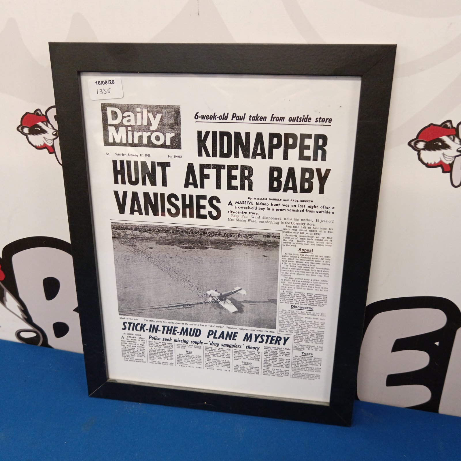 Vintage Daily Mirror newspaper headline about a baby kidnapping.