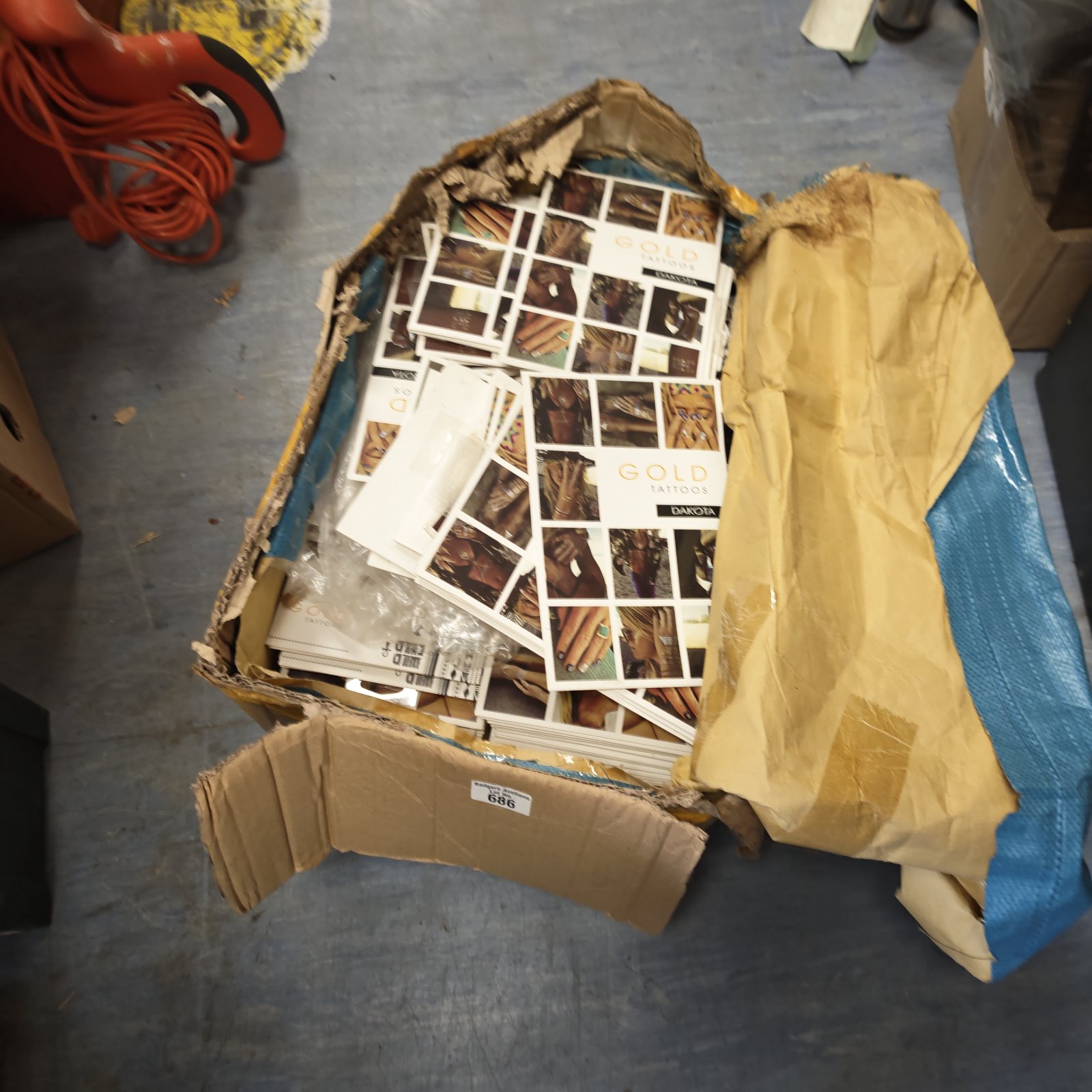 Box of vintage Dakota gold transfer tattoos for collectors.