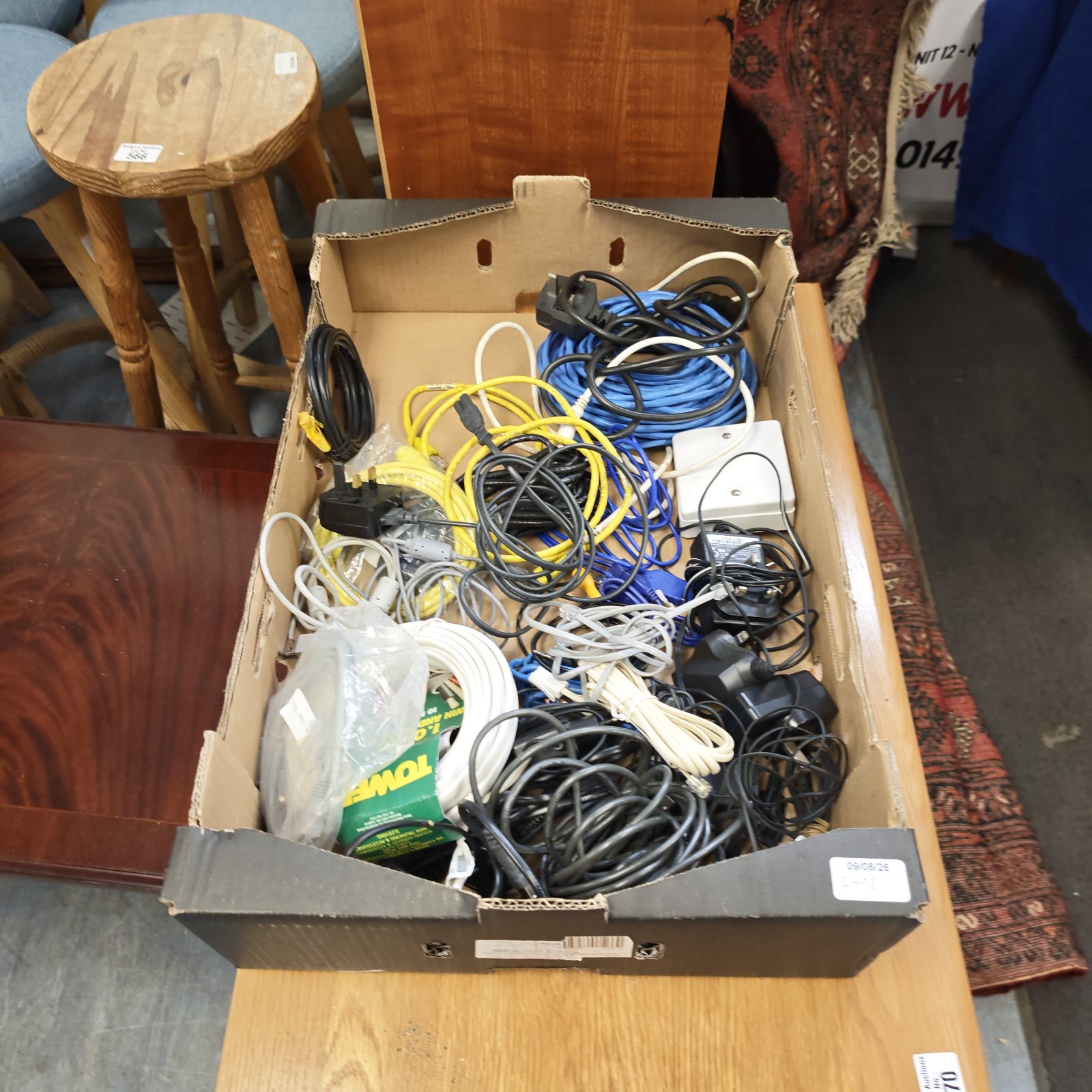 Mixed lot of data and power cables for various electronic devices.