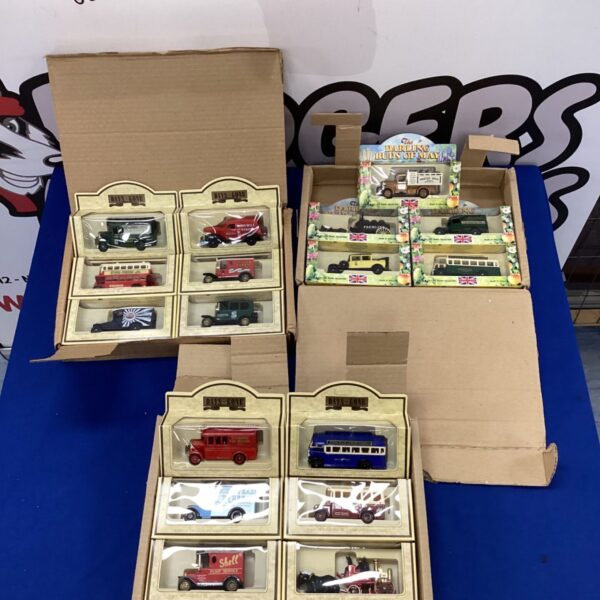 Days Gone and Darling Buds of May diecast model vehicles in boxes.