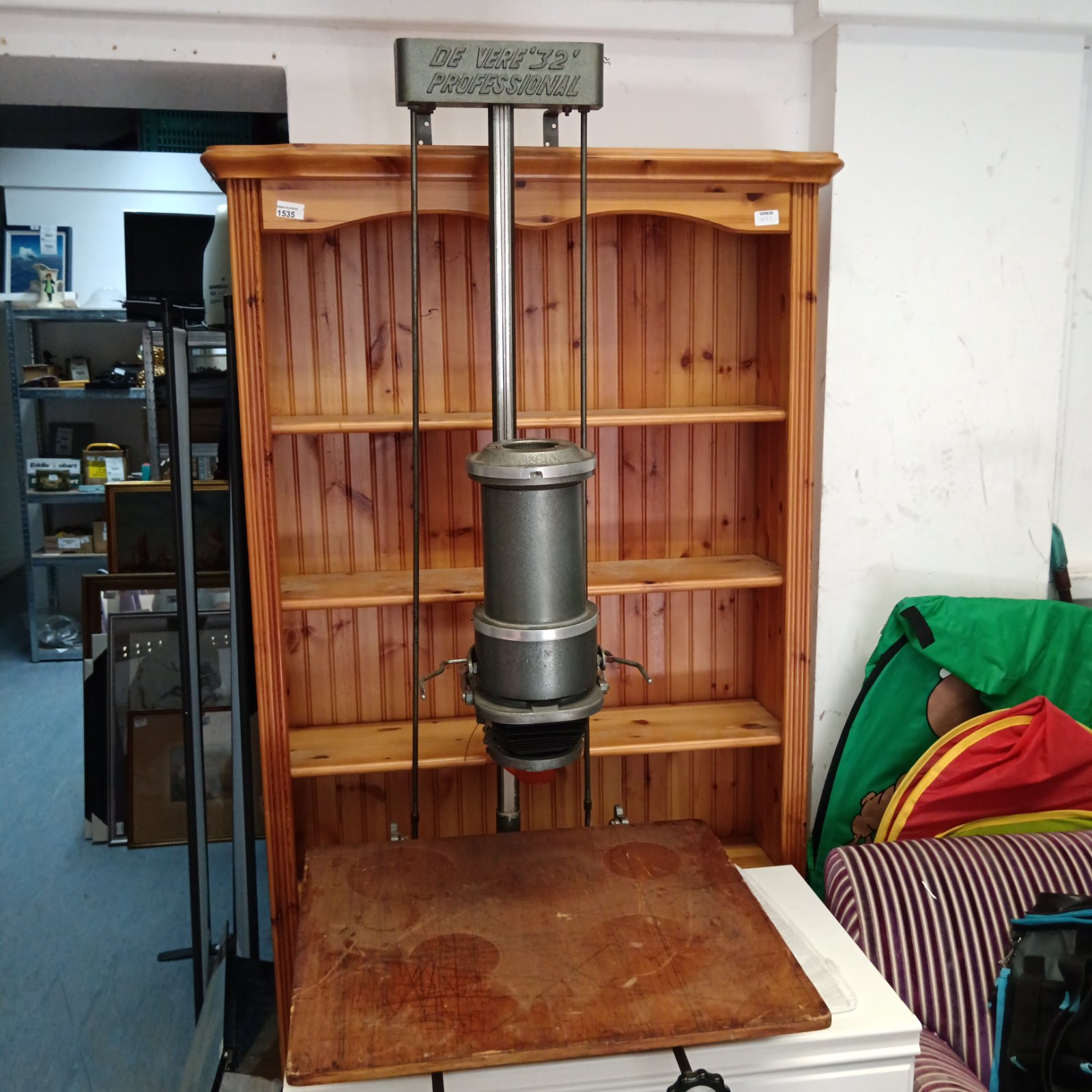 Vintage de vere 32 inch professional photo enlarger in a workshop.