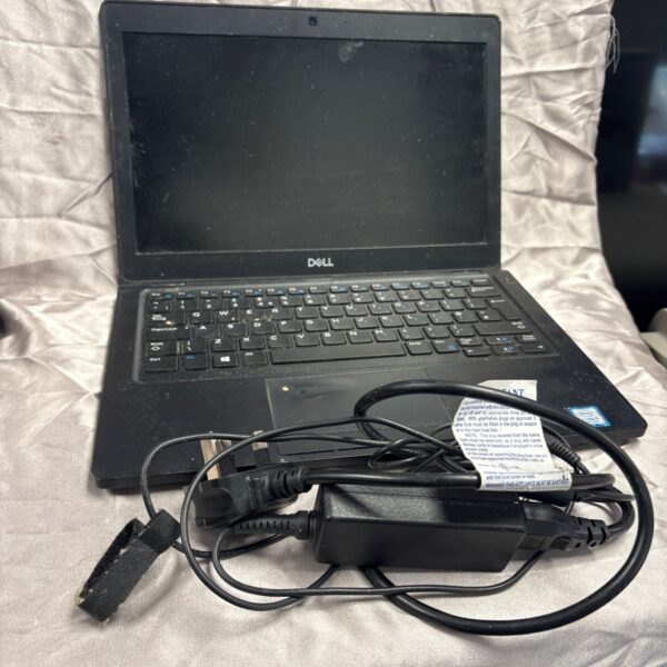 Dell Latitude 5290 laptop with charger included, black business computer.