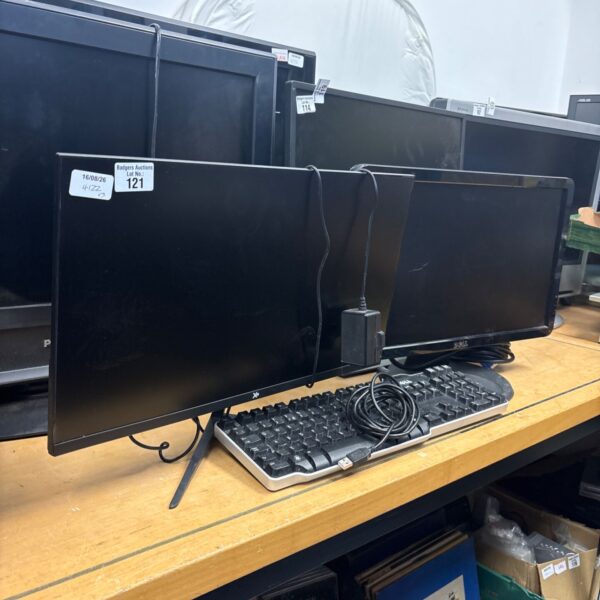 Dell monitor with HP monitor and keyboard in a lot.