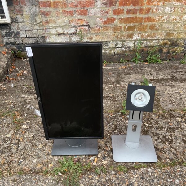 Black Dell monitor on silver swivel stand, side view.