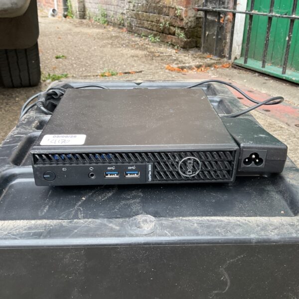 Front view of the Dell Optiplex 3000 mini PC with ports visible.