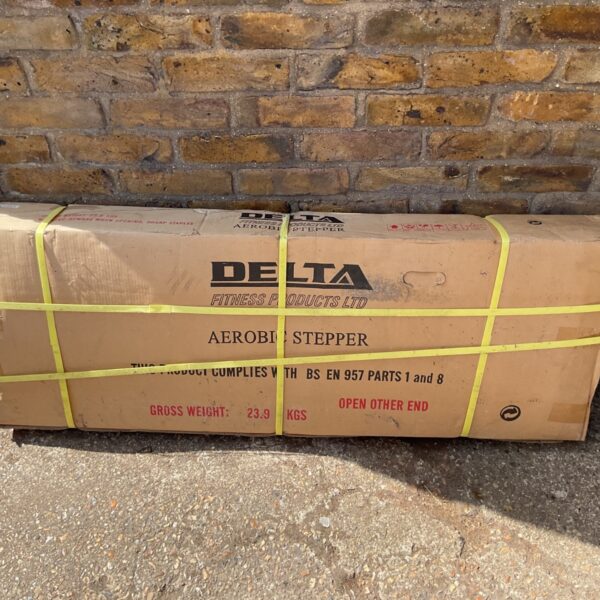 Packaged Delta Fitness aerobic stepper for home exercise.