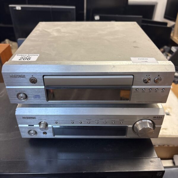 Silver Denon DCD-F101 compact disc player, vintage audio equipment.