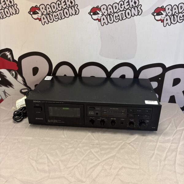 Front view of a vintage Denon tape deck, classic stereo audio equipment.