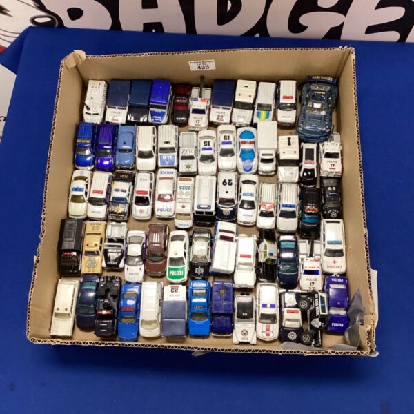 Mixed lot of diecast emergency vehicles including police cars and fire engines.