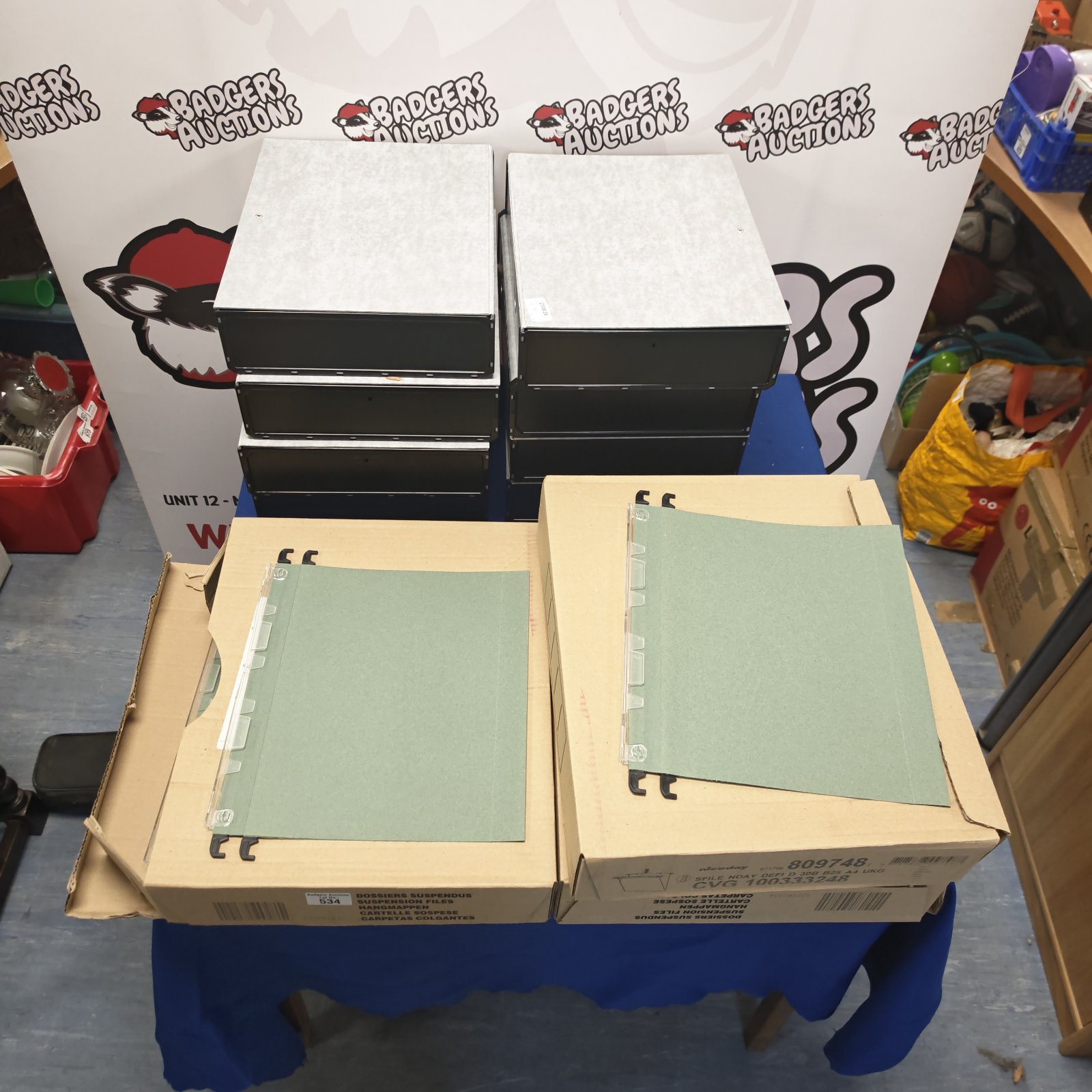 Lot of document folders and filing cabinet holders for office storage.