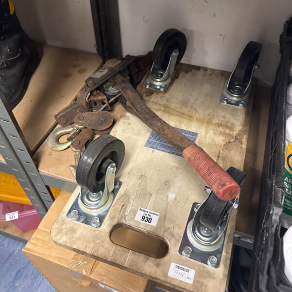 Vintage dolly wheels with winch mechanism for heavy duty use.