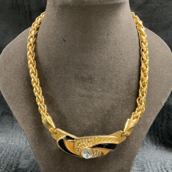 Vintage D’Orian statement necklace with crystal pendant and gold chain.
