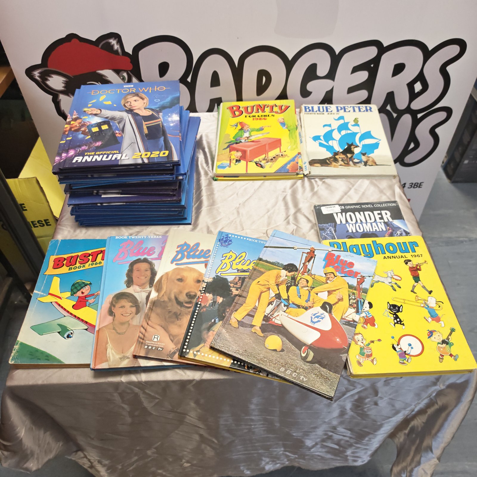 Stack of vintage Dr Who and Blue Peter annuals for collectors.