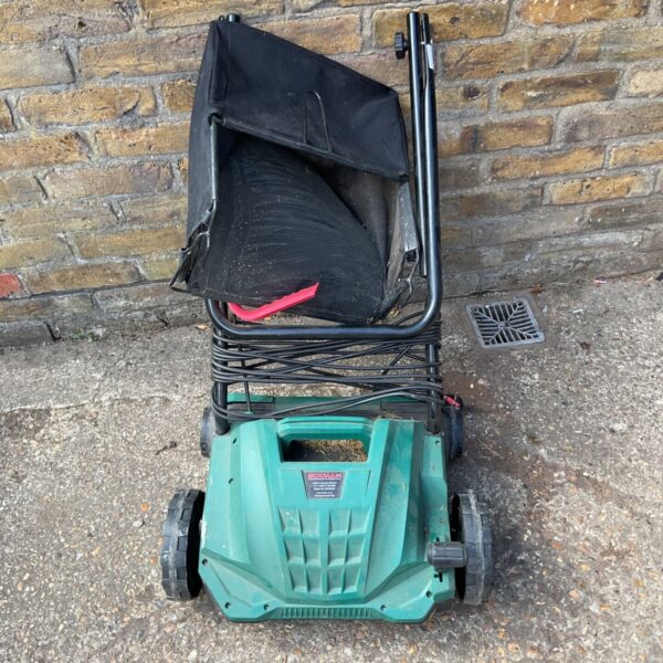 Eckman electric scarifier rake for lawn care and dethatching.