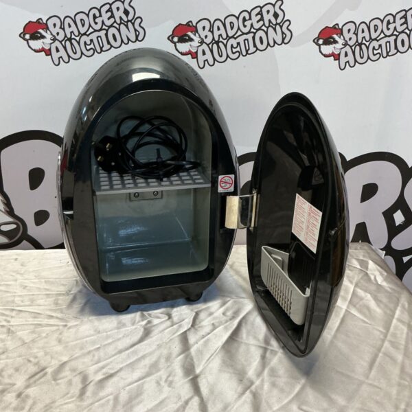 Egg shaped mini fridge warmer for desk or travel.