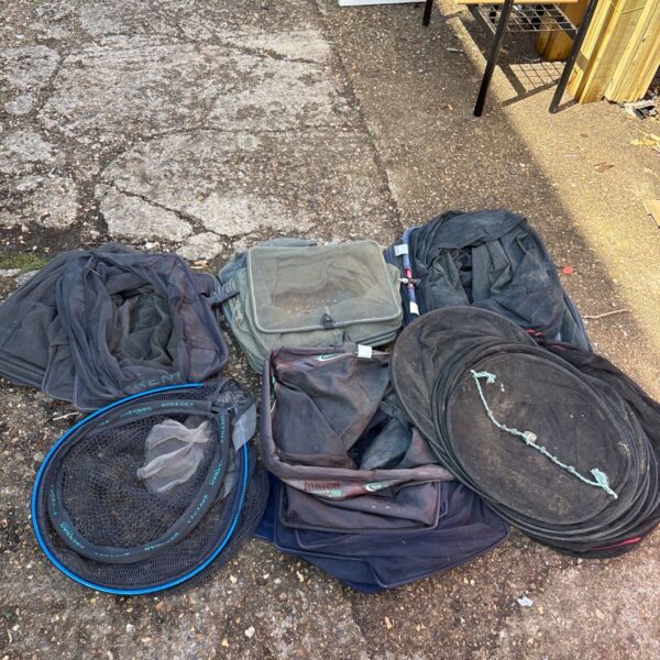 Lot of six used fishing landing nets for various fish species.