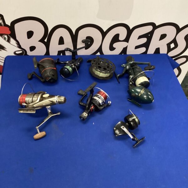 Collection of vintage fishing reels including a Leader reel.